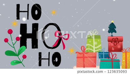 Image of snow falling and ho text over presents on grey background at christmas 123635093