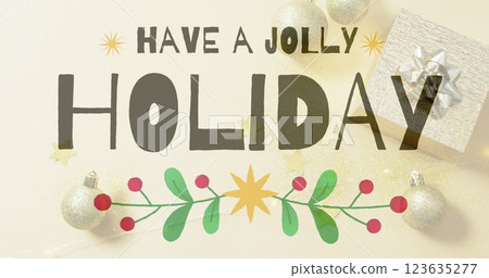 Image of have a jolly holiday text over christmas baubles Image of have a jolly holiday text over christmas baubles 123635277