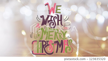 Image of christmas greetings text over christmas decorations 123635320