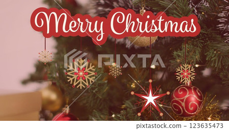 Image of merry christmas text over christmas decorations Image of merry christmas text over christmas decorations 123635473