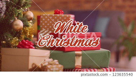 Image of christmas greetings text over christmas presents and decorations Image of christmas greetings text over christmas presents and decorations 123635540