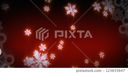 Image of glowing snowflakes falling against red background with copy space Image of glowing snowflakes falling against red background with copy space 123635647