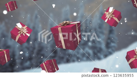 Image of falling snow and red christmas presents over winter landscape Image of falling snow and red christmas presents over winter landscape 123635955