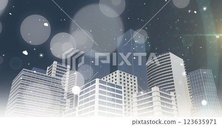 Image of christmas snow falling over city buildings and spots of light in night sky 123635971