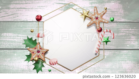Image of snow falling over christmas decorations around white hexagonal sign on wooden boards Image of snow falling over christmas decorations around white hexagonal sign on wooden boards 123636020