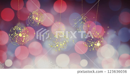 Image of gold christmas stars and baubles swinging over defocussed red and white lights Image of gold christmas stars and baubles swinging over defocussed red and white lights 123636036