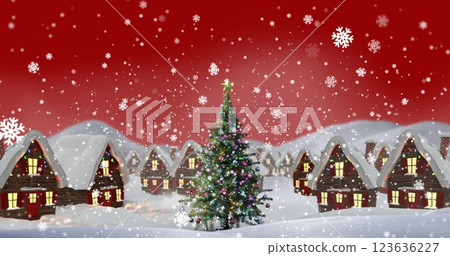 Image of snow falling over winter village with christmas tree 123636227