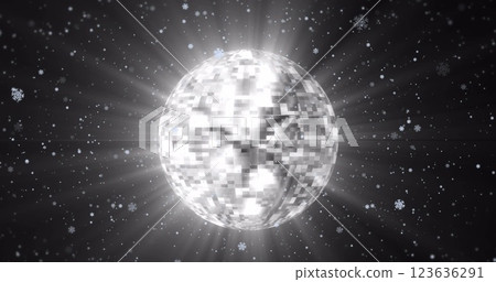 Image of disco ball and snow falling on black background 123636291