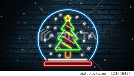 Image of snow falling over christmas tree 123636425