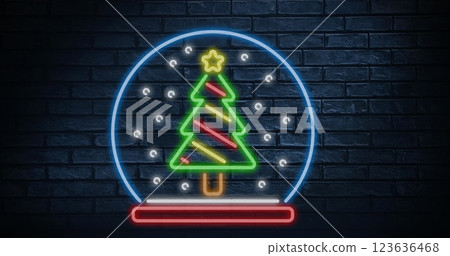 Image of brick wall with christmas tree in snow globe 123636468