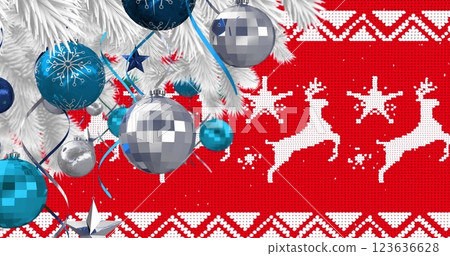 Image of snow falling over christmas baubles decoration on red background 123636628