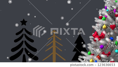Image of snow falling over christmas trees and decorations 123636653
