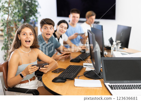 Student are engrossed in their mobile Student are engrossed in their mobile 123636681