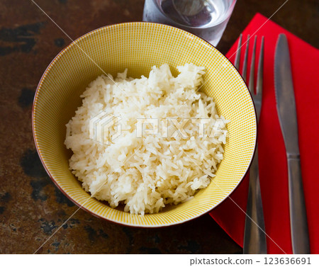 Cooked white rice in bowl close up, food concept 123636691