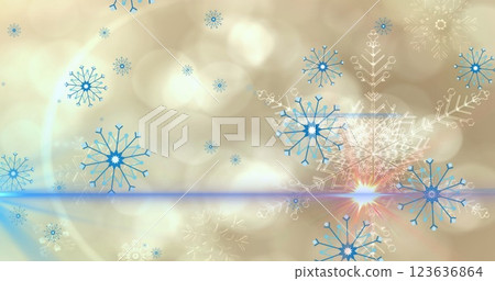This image features blue snowflakes falling against a black background 123636864