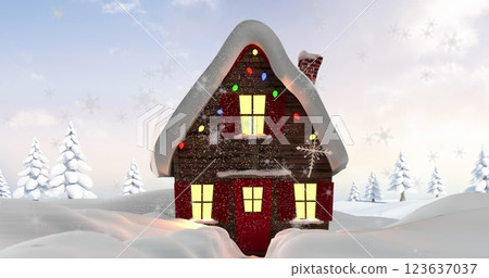 Image of snow falling over christmas decorated house in winter scenery Image of snow falling over christmas decorated house in winter scenery 123637037