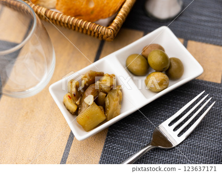 Pickled eggplant and olives appetizer close up Pickled eggplant and olives appetizer close up 123637171