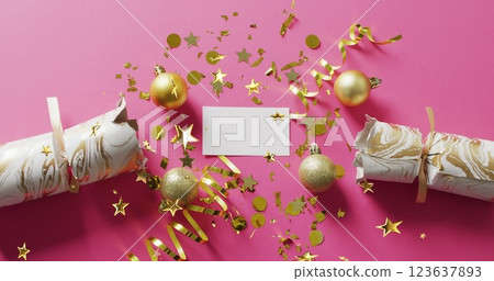 Image of gold stars falling, baubles and crackers 123637893