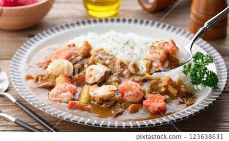 Seafood curry (scallops, squid, shrimp) 123638631