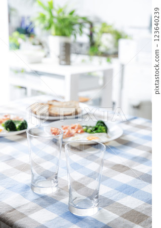 Kitchen table background tablecloth glasses 123640239