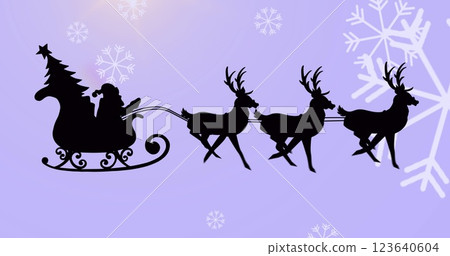Santa claus in sleigh being pulled by reindeers over snowflakes falling against purple background 123640604