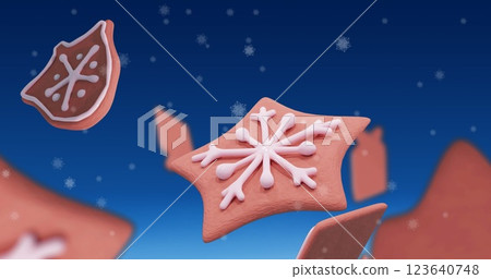 Image of christmas gingerbread cookies over snowflakes falling on blue background Image of christmas gingerbread cookies over snowflakes falling on blue background 123640748