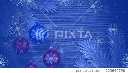 Image of snowflakes icons falling over hanging bauble decorations against wooden surface Image of snowflakes icons falling over hanging bauble decorations against wooden surface 123640798