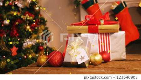 Image of dots moving over presents and christmas tree 123640905