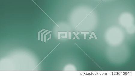 Image of multiple snowflakes icons falling over spots of light against green background Image of multiple snowflakes icons falling over spots of light against green background 123640944
