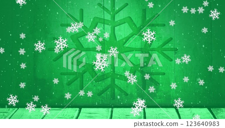 Image of snowflakes falling over wooden plank against snowflake icon on green background Image of snowflakes falling over wooden plank against snowflake icon on green background 123640983