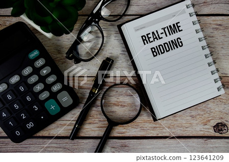Real-time Bidding (RTB) text on notepad, Business and Financial concept background 123641209