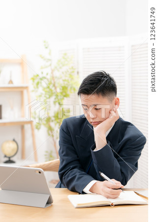 Boys, teenagers, studying 123641749