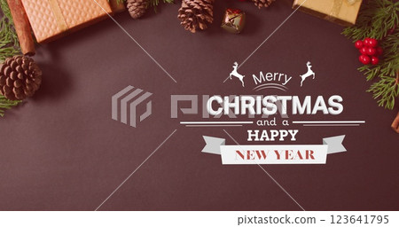 Image of merry christmas and happy new year text banner over christmas decorations and gifts Image of merry christmas and happy new year text banner over christmas decorations and gifts 123641795