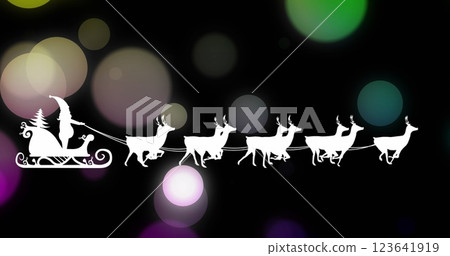 Image of santa in sleigh at christmas over spots 123641919