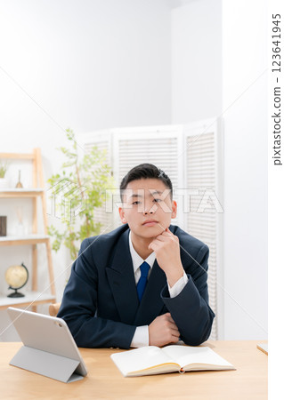 Boy, teenager, studying, smiling 123641945