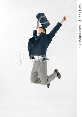 Boys, teenagers, uniforms, jumping 123641969