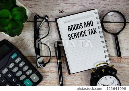 Goods and Service Tax (GST) text on notepad, Business and Financial concept background 123641996