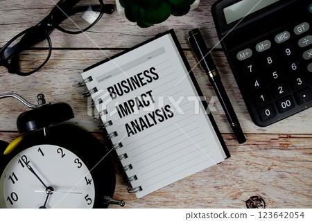 Business Impact Analysis (BIA) text on notepad, Business and Financial concept background Business Impact Analysis (BIA) text on notepad, Business and Financial concept background 123642054