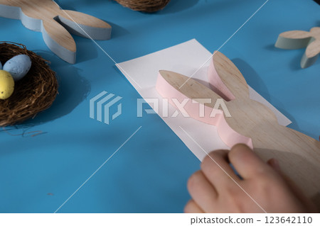 Drawing Easter rabbit bunny HOLD THE EARS STIFF humor saying Storytelling of creating craft Easter greeting card holiday present. Tactile hand-on activity. Master class progress of creative me-made 123642110