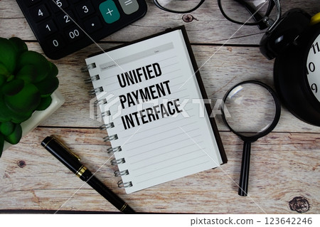 Unified Payment Interface (UPI) text on notepad, Business and Financial concept background 123642246