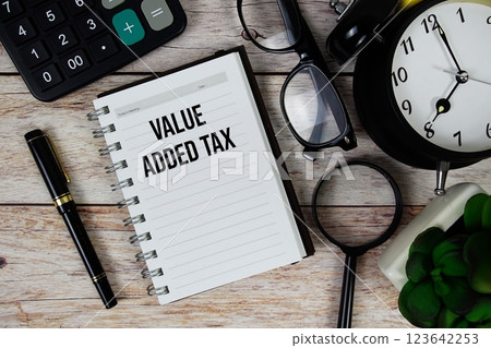 Value Added Tax (VAT) text on notepad, Business and Financial concept background Value Added Tax (VAT) text on notepad, Business and Financial concept background 123642253