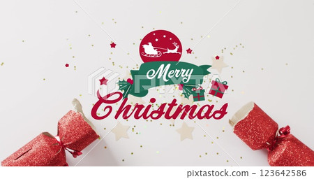 Image of christmas greetings text over christmas decorations 123642586