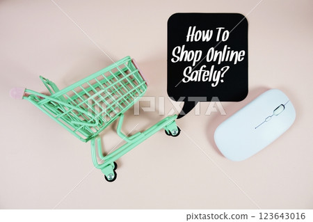 How To Shop Online Safely? text on speech bubble with optical mouse and trolley shopping cart on pink background 123643016