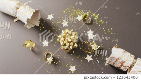 Image of christmas greetings text over christmas decorations 123643400