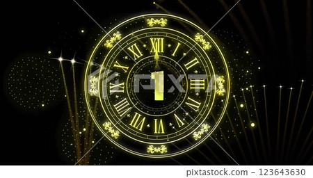 Image of clock showing midnight and fireworks exploding on black background 123643630