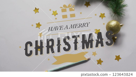 Image of have a merry christmas text over christmas decorations on white background 123643824