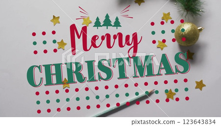 Image of merry christmas text over christmas decorations Image of merry christmas text over christmas decorations 123643834