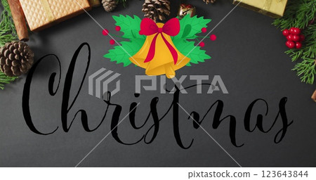 Image of christmas text over christmas decorations 123643844