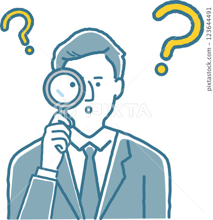 Male business person looking through a magnifying glass 123644491