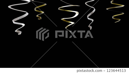 Image of gold and silver streamers on black background 123644513